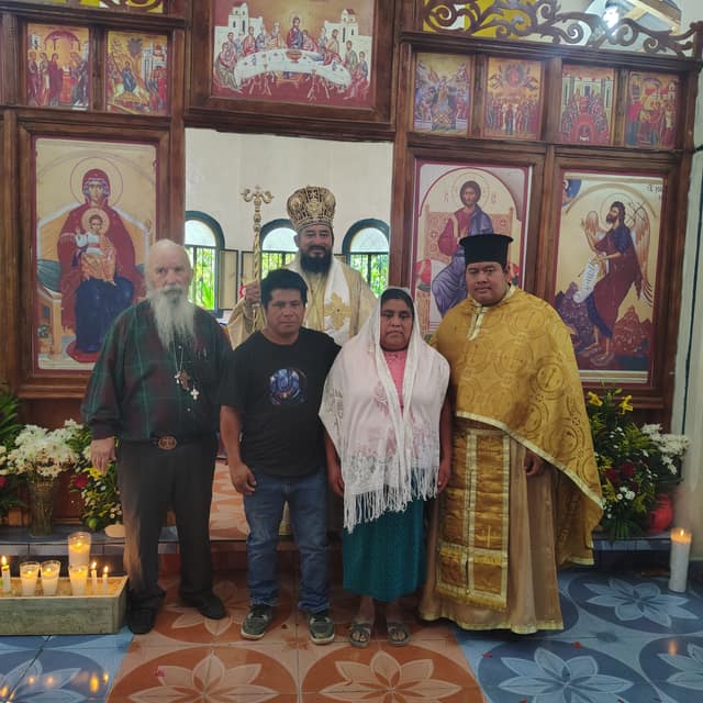 The visitor from Arizona with the bishop and faithful before the iconostasis